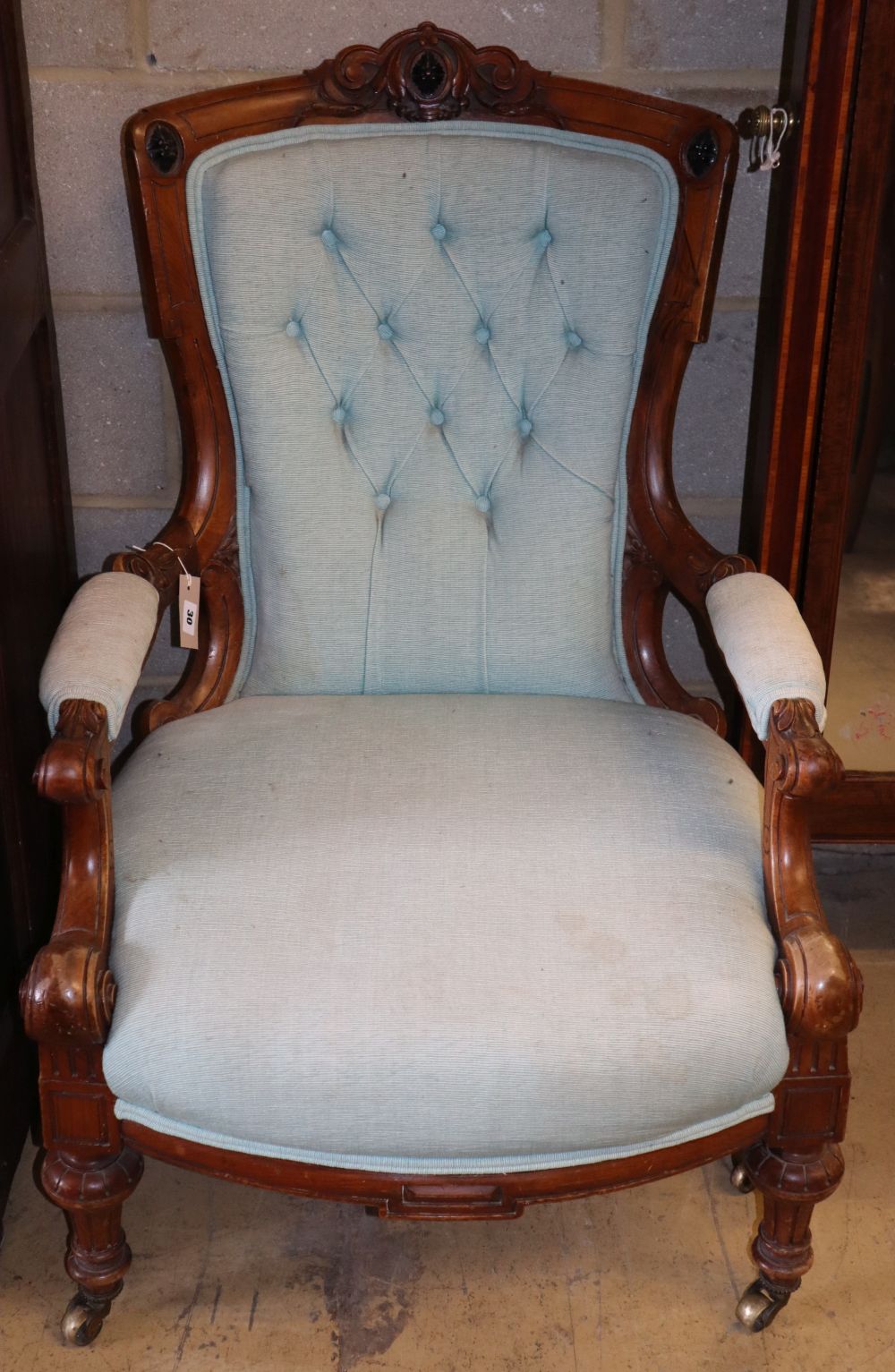 A Victorian mahogany open armchair